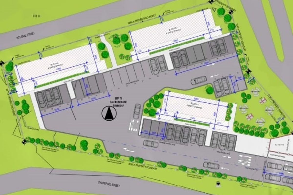A detailed site development plan showing the layout of building blocks, parking areas, and property boundaries for the residential development.