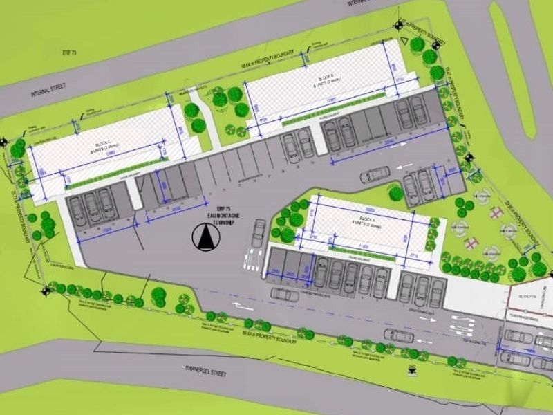 A detailed site development plan showing the layout of building blocks, parking areas, and property boundaries for the residential development.