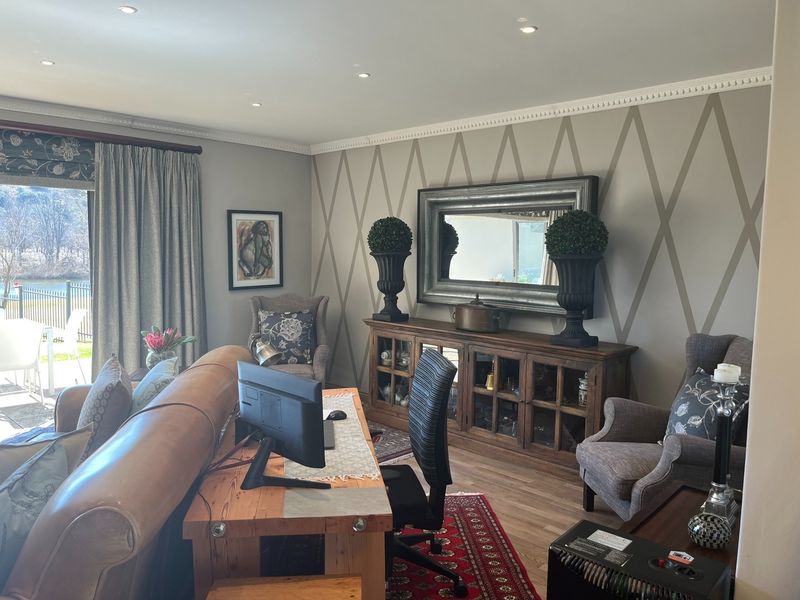 Elegant home located beside the river, featuring stunning views. - Photo 3