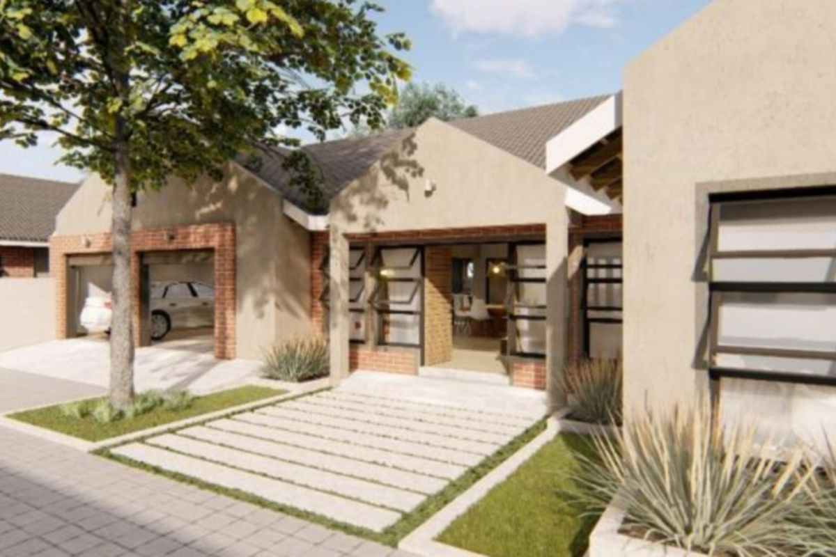 Front elevation of a modern residential property featuring a brick facade, tiled roof, integrated garage, and paved driveway with landscaped garden elements.