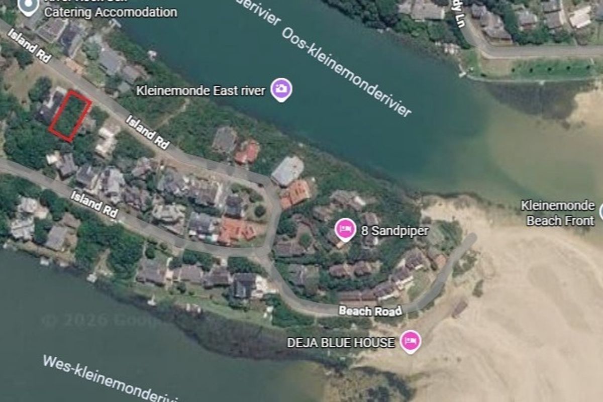 Aerial satellite view showing the location of the vacant residential plot in relation to the river and surrounding coastal neighborhood.