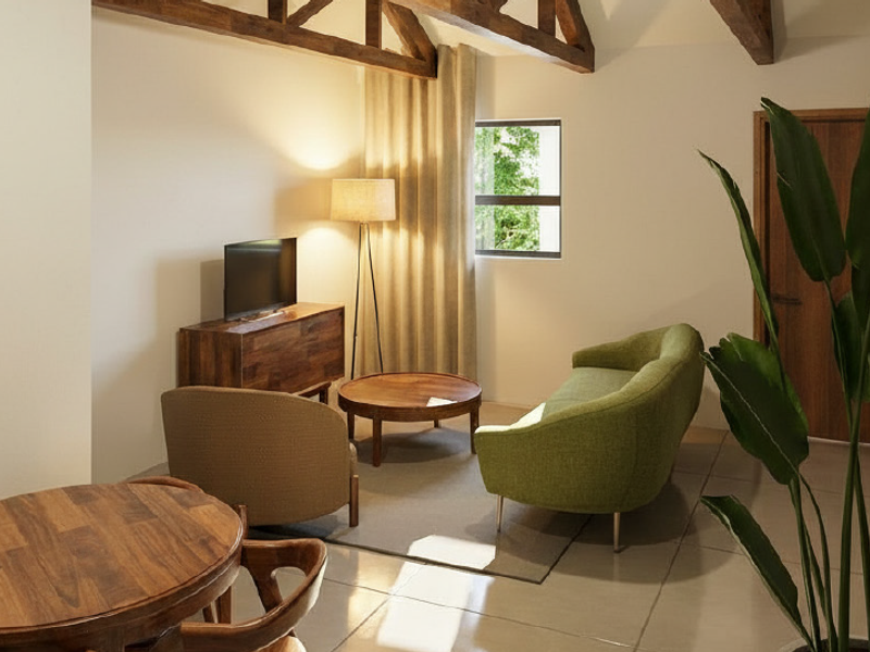 A cozy living area featuring exposed timber ceiling beams, tiled flooring, and a warm, inviting atmosphere with natural light.