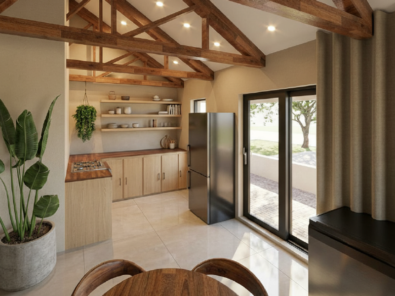 Modern kitchen featuring exposed timber roof trusses, light wood cabinetry, wooden countertops, and direct access to the outdoor area through sliding glass doors.