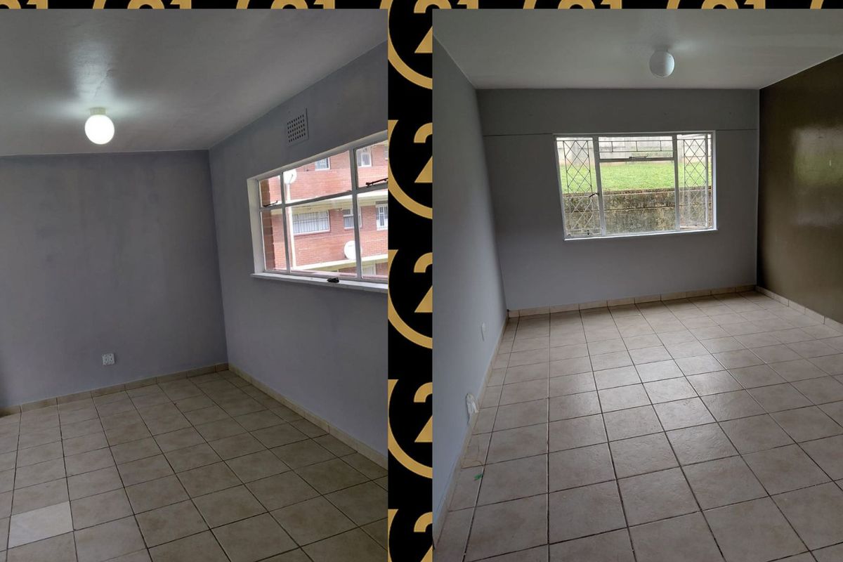An empty bedroom featuring tiled flooring, a metal-framed window, and a simple ceiling light fixture.