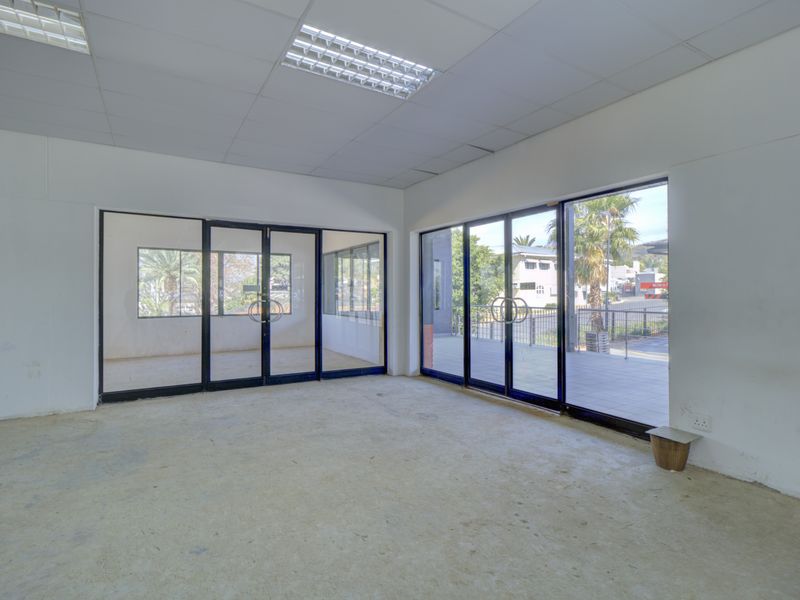 Corner shop with large patio - Photo 8