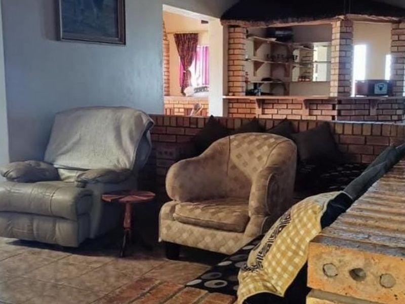 Very neat and spacious house with 1 bedroom flat for sale in Eloff - Photo 3