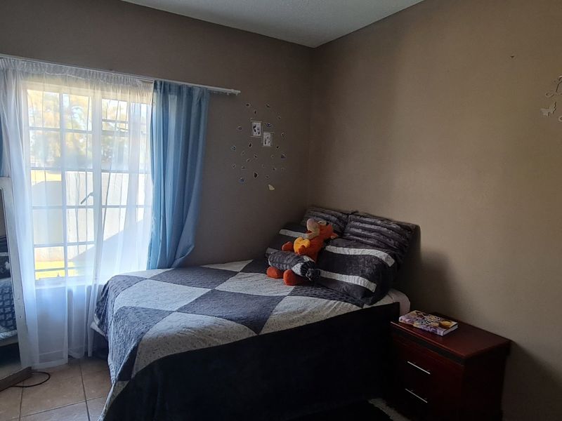 Welcome to your dream home in a secure Estate! This exquisite ground floor unit boats 2 bedroom and - Photo 9