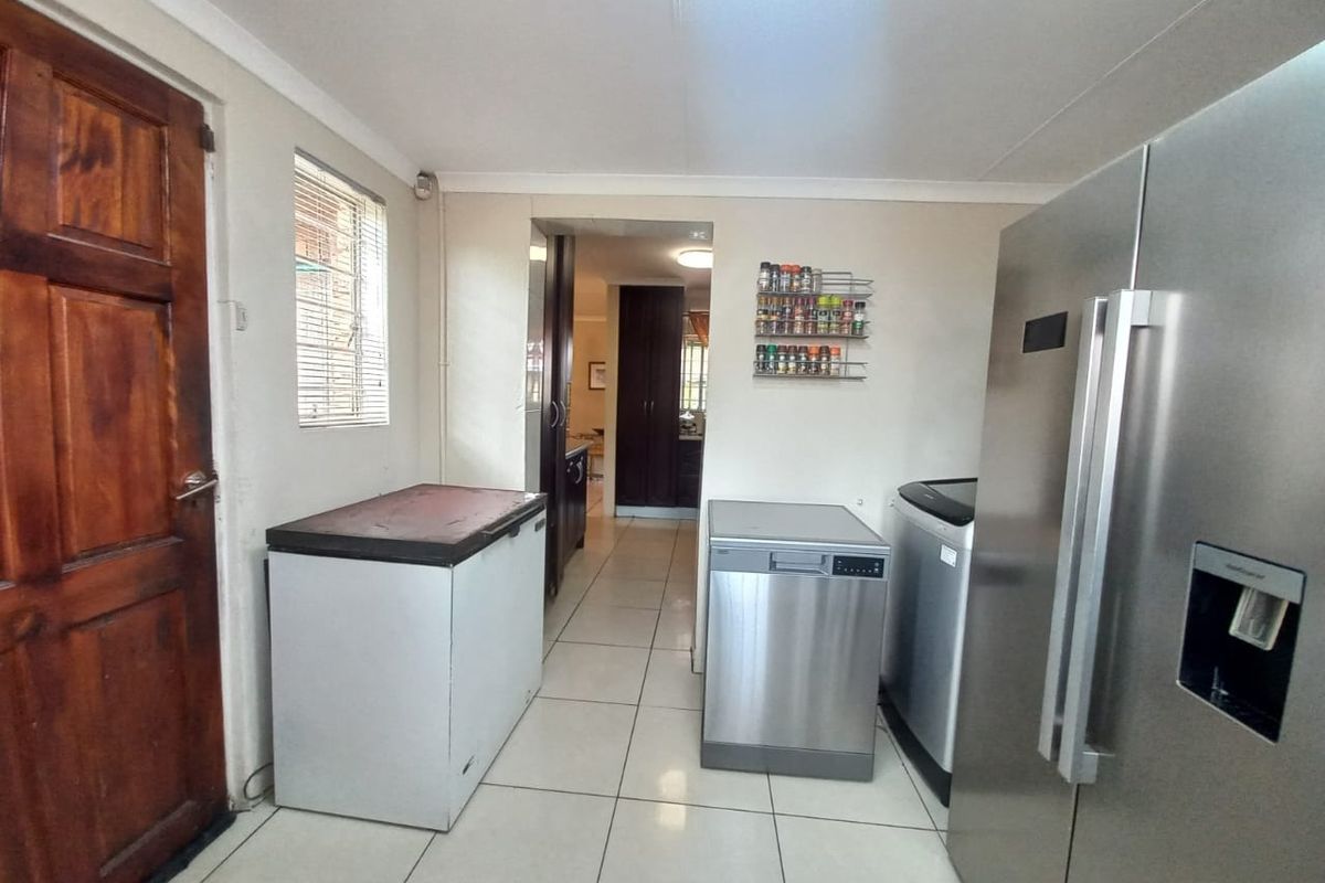 Spacious Family Retreat with Modern Amenities and Expansive Outdoor Potential - Photo 5