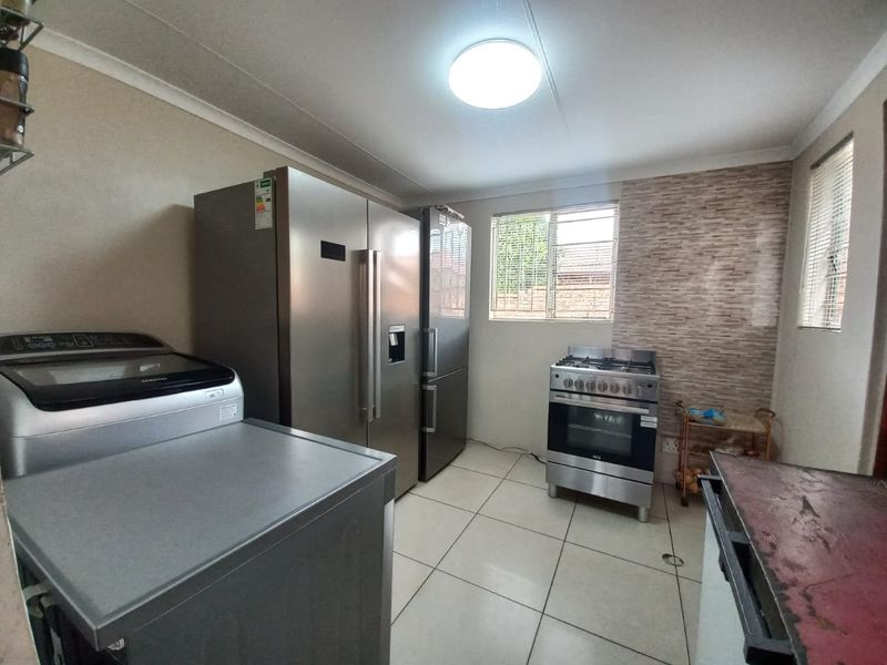 Spacious Family Retreat with Modern Amenities and Expansive Outdoor Potential - Photo 6