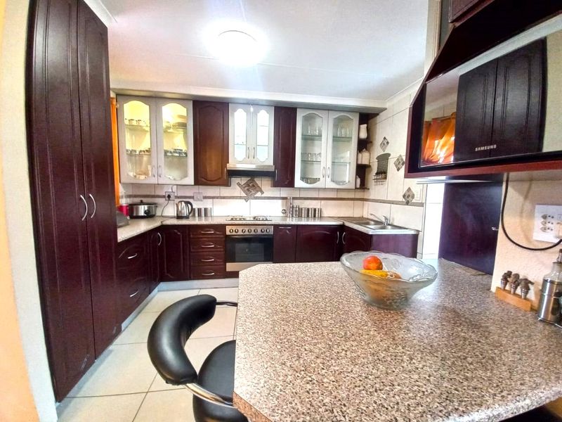 Spacious Family Retreat with Modern Amenities and Expansive Outdoor Potential - Photo 1