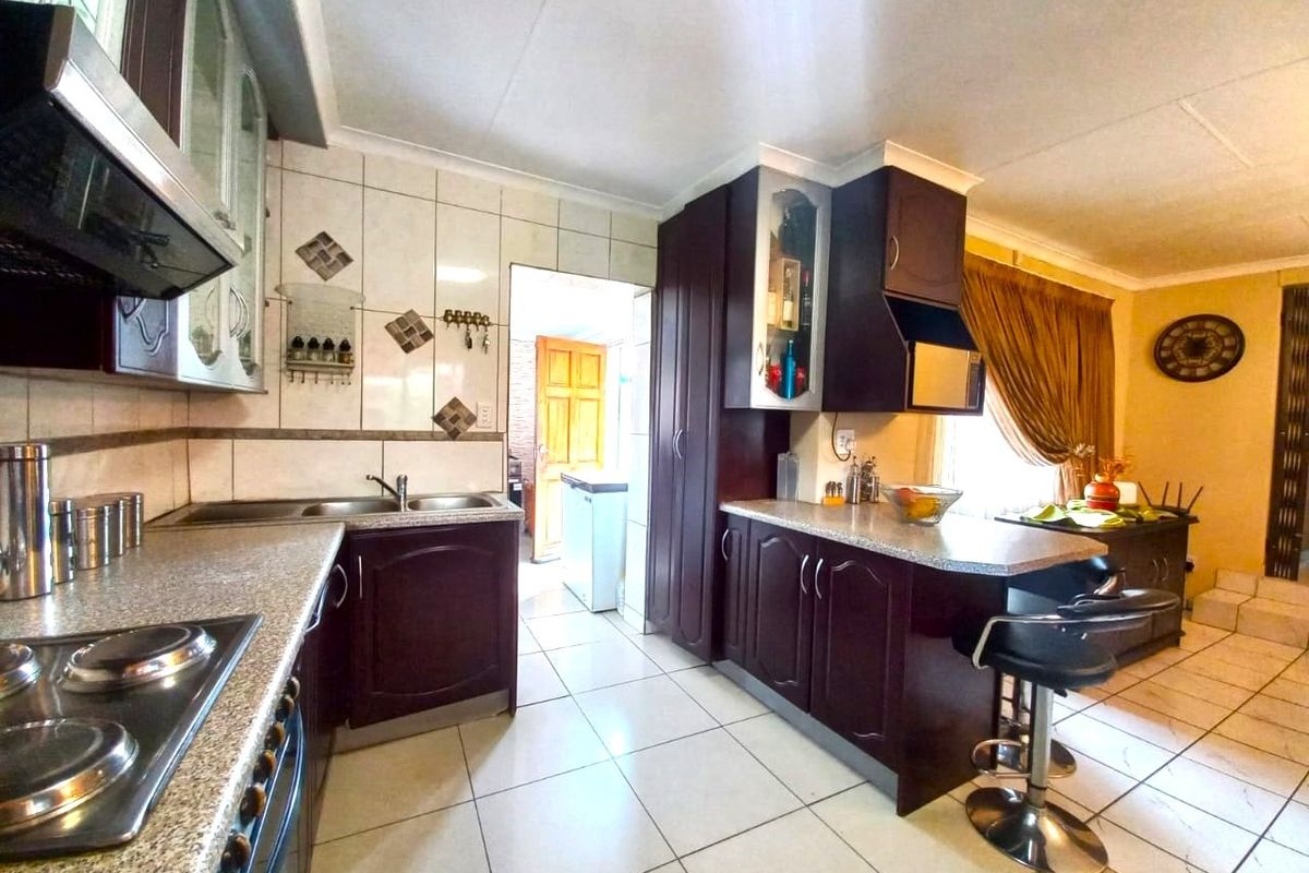 Spacious Family Retreat with Modern Amenities and Expansive Outdoor Potential - Photo 4