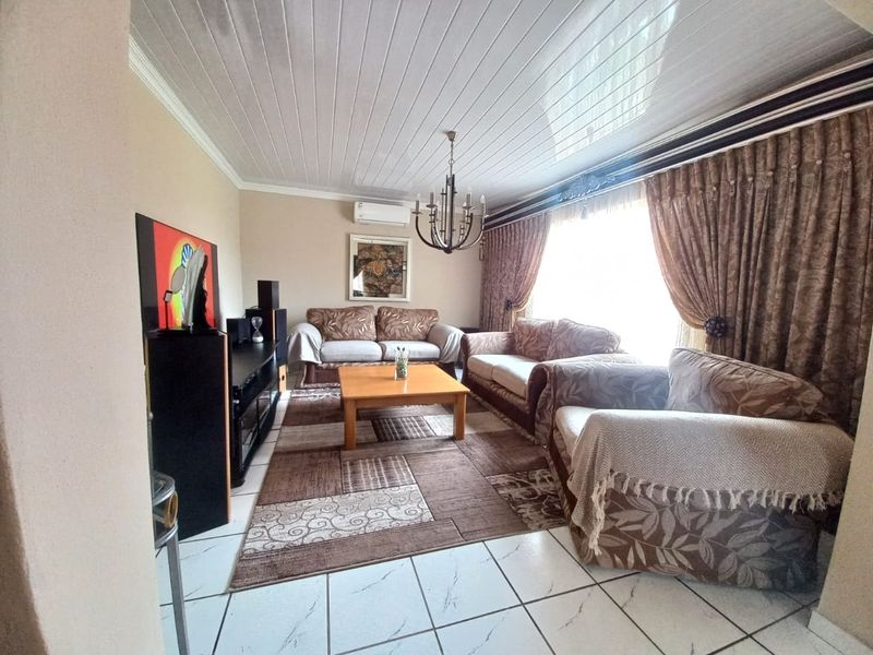 Spacious Family Retreat with Modern Amenities and Expansive Outdoor Potential - Photo 8