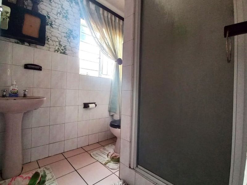 Spacious Family Retreat with Modern Amenities and Expansive Outdoor Potential - Photo 9