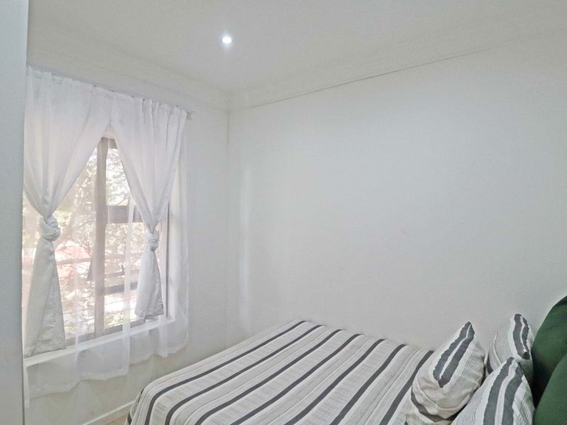 1st-Floor 2-Bedroom Apartment in Secure Boomed-Off Area For Sale in Rivonia - Photo 8