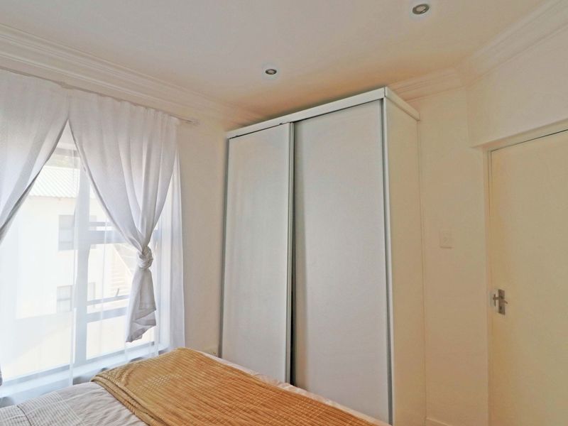 1st-Floor 2-Bedroom Apartment in Secure Boomed-Off Area For Sale in Rivonia - Photo 6