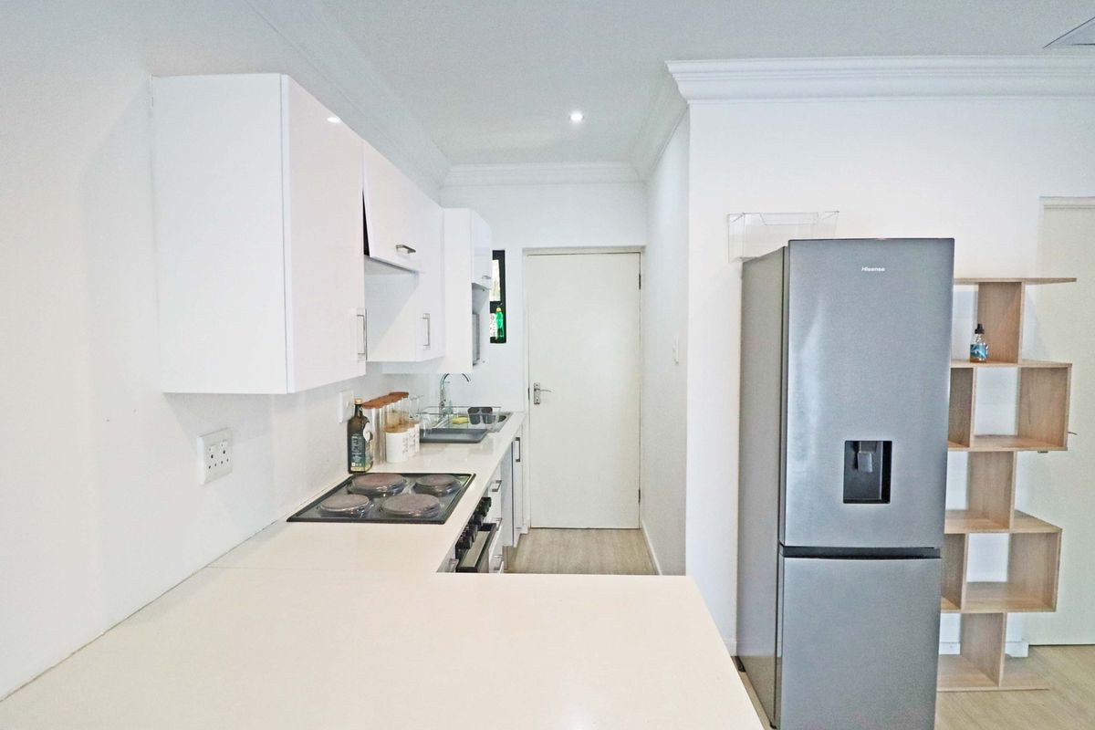 1st-Floor 2-Bedroom Apartment in Secure Boomed-Off Area For Sale in Rivonia - Photo 4