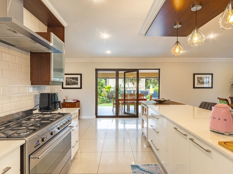 Modern 4-Bedroom Home in Exclusive Secure Estate - Photo 7