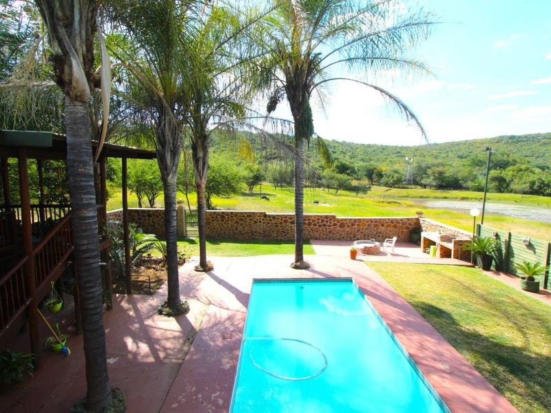 BARGAIN - ESCAPE TO NATURE'S EMBRACE-YOUR FARM RETREAT AMIDST ABUNDANT WILDLIFE IN MODIMOLE - Photo 2