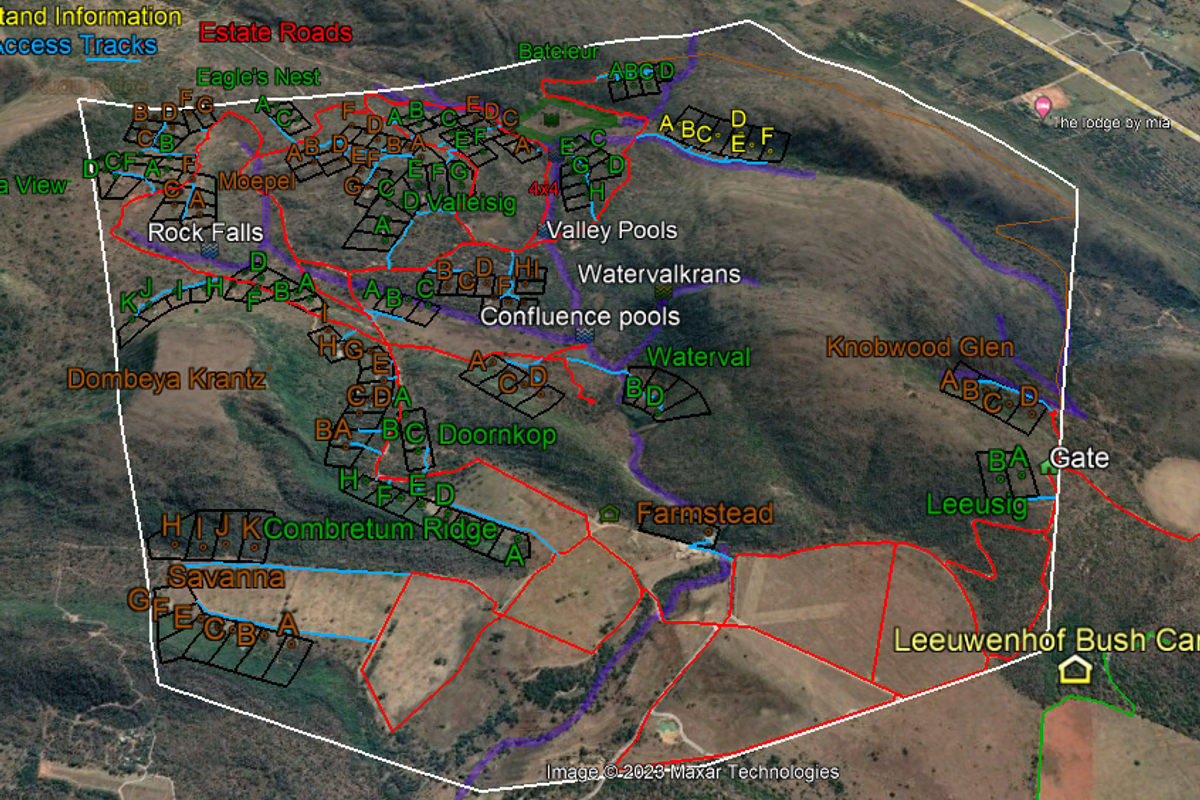 An aerial map view of the residential estate showing various land plots, access tracks, and estate infrastructure.
