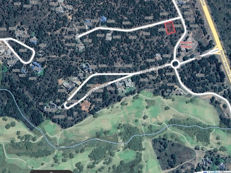 An aerial view showing the location of the vacant residential land plot within the estate, highlighting its position relative to surrounding roads and greenery.