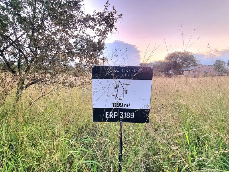 A vacant residential stand measuring 1199 square meters, located within the Koro Creek Bushveld Golf Estate.