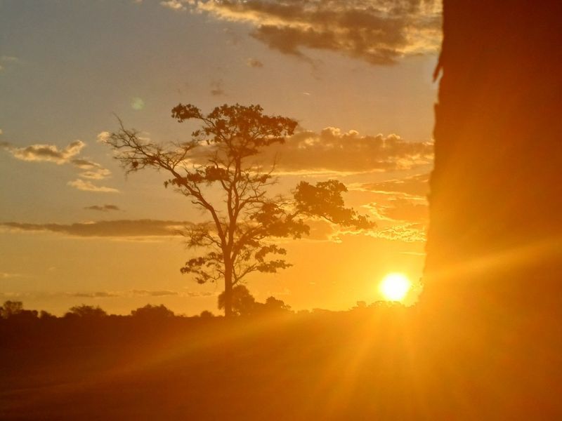 A scenic sunset view over the vacant residential land, highlighting the natural landscape and horizon.