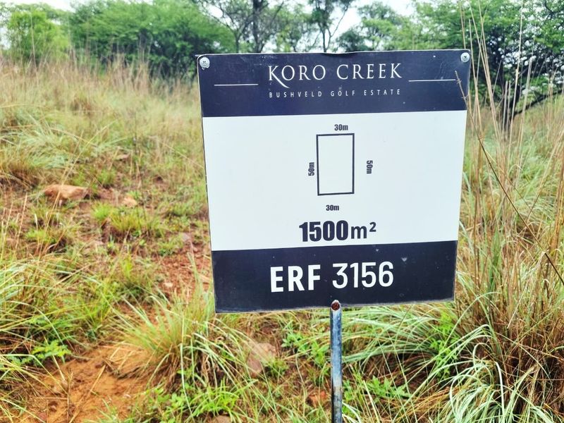 A signage board displaying the dimensions and details of the 1500 square meter vacant residential stand located in Koro Creek Bushveld Golf Estate.
