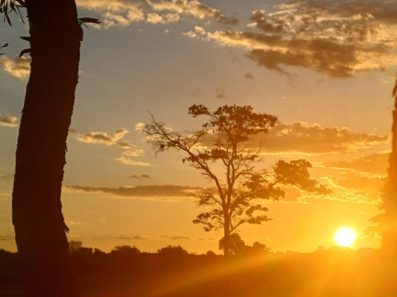 A scenic sunset view over the vacant residential land, highlighting the natural landscape and horizon.