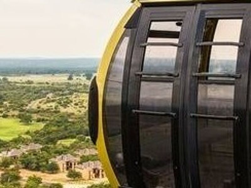 A scenic elevated view overlooking the surrounding landscape and residential area.