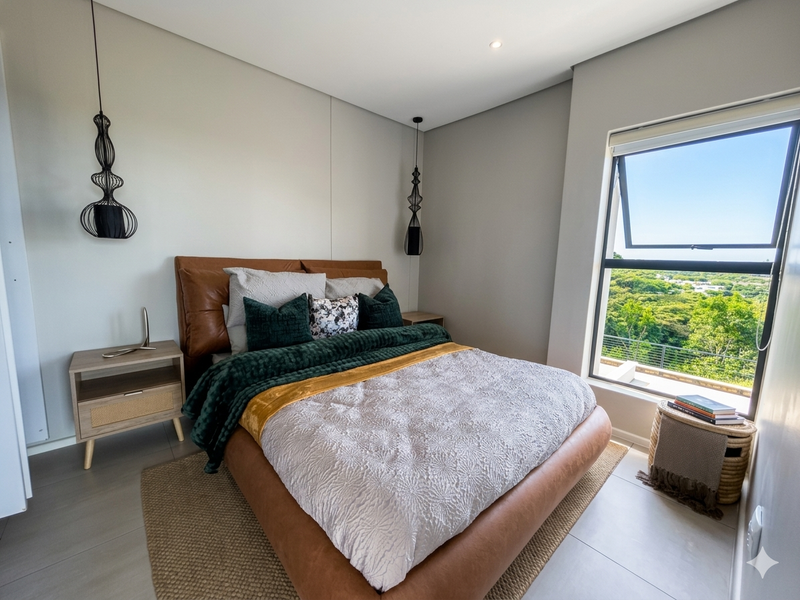 A modern, well-maintained bedroom featuring tiled flooring, recessed lighting, and a large top-hung window offering scenic outdoor views.