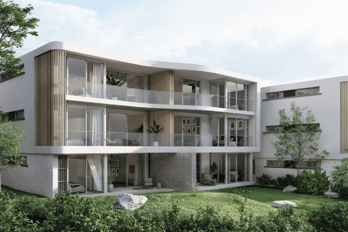 A modern apartment building exterior featuring contemporary architectural design, glass balconies, stone accents, and landscaped garden areas.