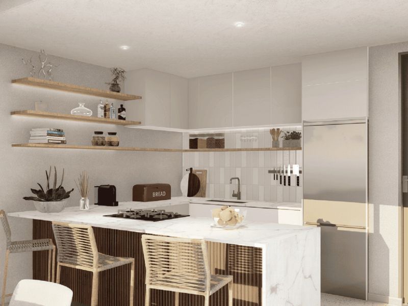 Modern kitchen featuring marble countertops, integrated cabinetry, floating shelves, and a subway tile backsplash, creating a clean and contemporary culinary space.