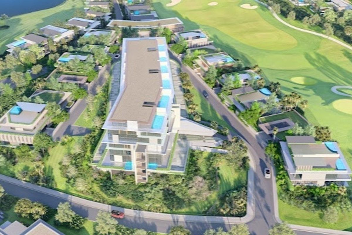 Aerial view of a modern residential development situated adjacent to a golf course, featuring multi-story buildings with private pools and landscaped surroundings.