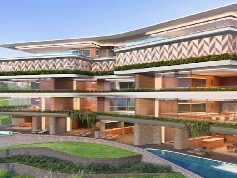 A modern multi-level residential building featuring expansive cantilevered balconies, glass balustrades, and integrated swimming pools overlooking a landscaped area.