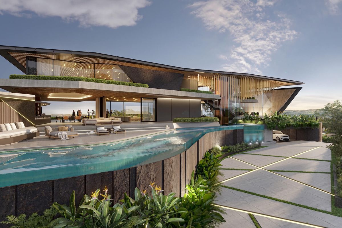 A luxury modern architectural residence featuring a striking infinity edge pool, expansive glass facades, and sophisticated stone detailing in a landscaped setting.