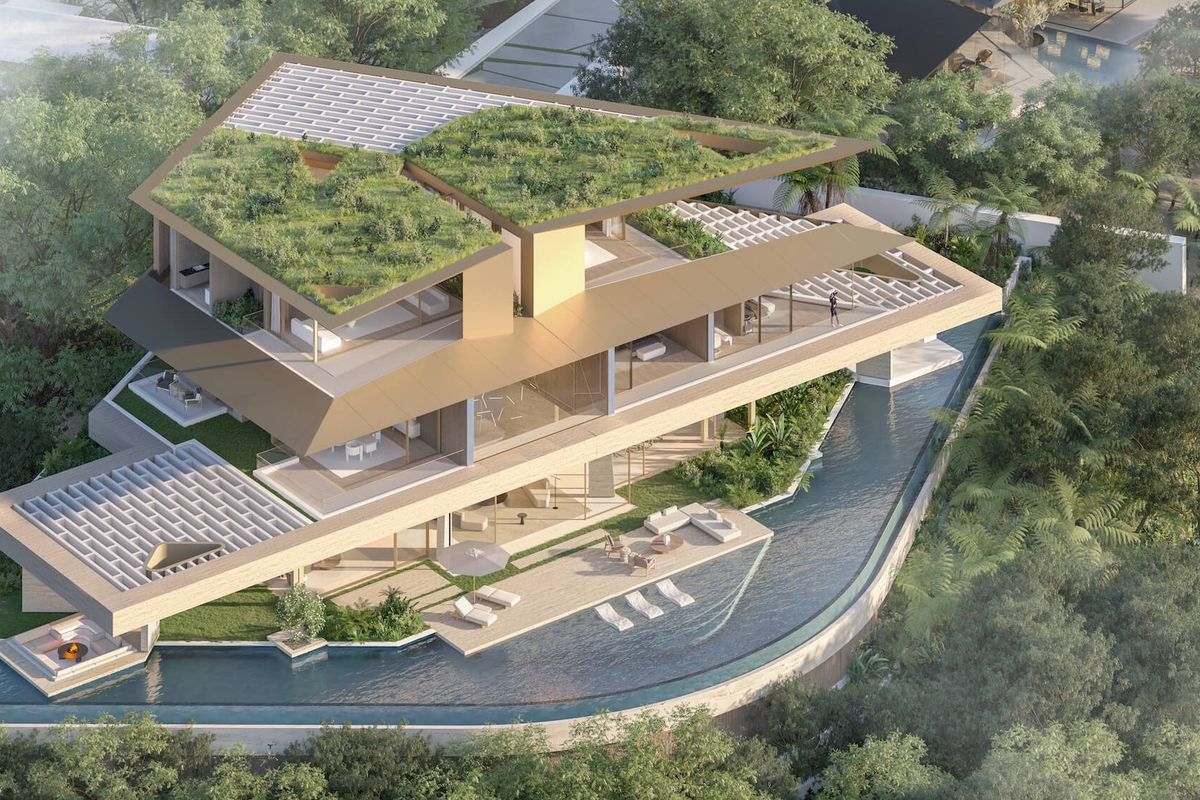 An aerial perspective of a modern luxury residence featuring a green roof, expansive terraces, and a sleek swimming pool integrated into a lush landscape.