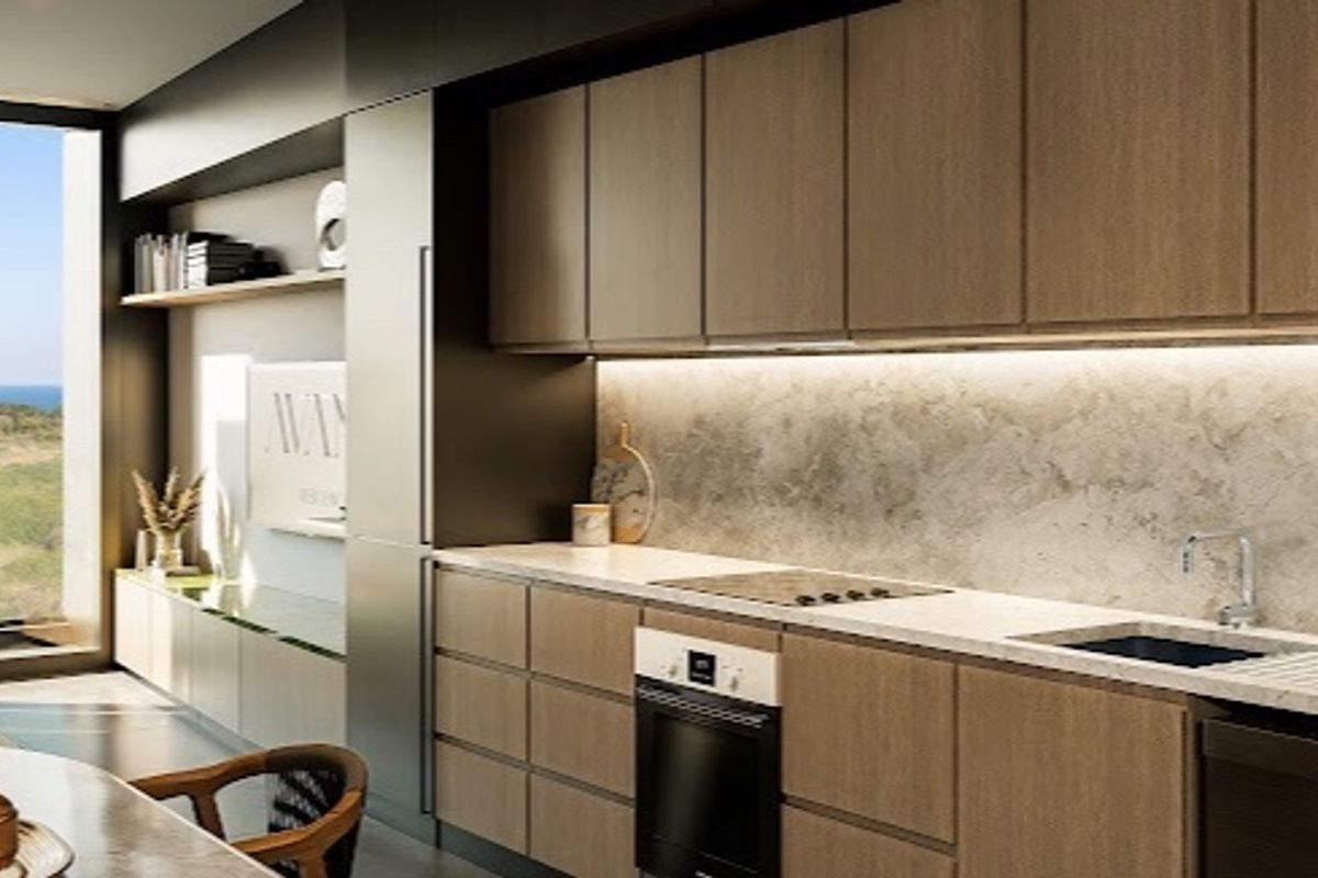 Modern kitchen featuring sleek wood-finish cabinetry, stone countertops, integrated appliances, and under-cabinet lighting, with large windows offering scenic views.