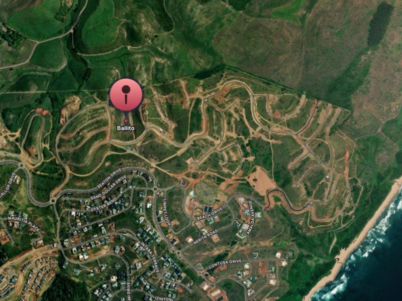 Aerial view of a residential development site in Ballito, showing the road layout and proximity to the coastline.