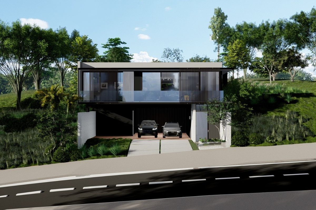 A modern two-story residential property featuring a sleek facade, glass balcony, and integrated double garage, set within a landscaped hillside environment.