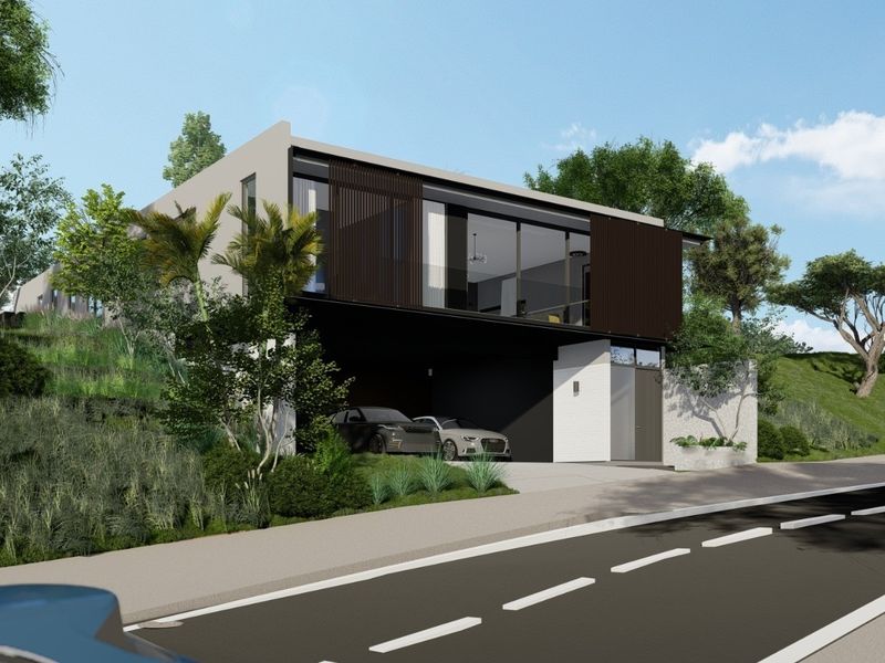 A modern architectural residential facade featuring clean lines, integrated covered parking, and large glass elements set within a landscaped hillside environment.