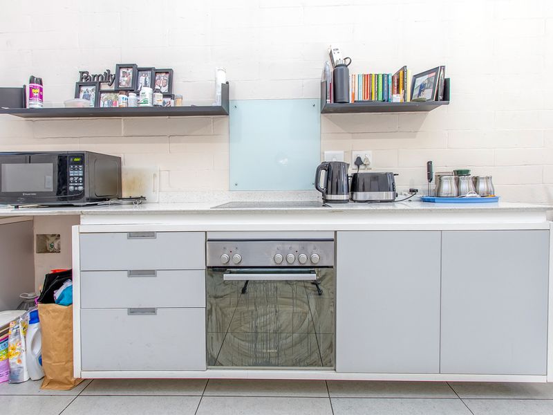 Modern Ground Floor Apartment with Private Patio, Storage & 24hr Security - Photo 6