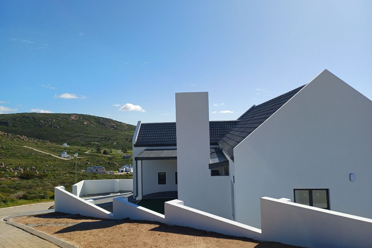 Beautiful Modern Home with Coastal & Mountain Panoramic Views for sale in St Helena Views - Photo 5