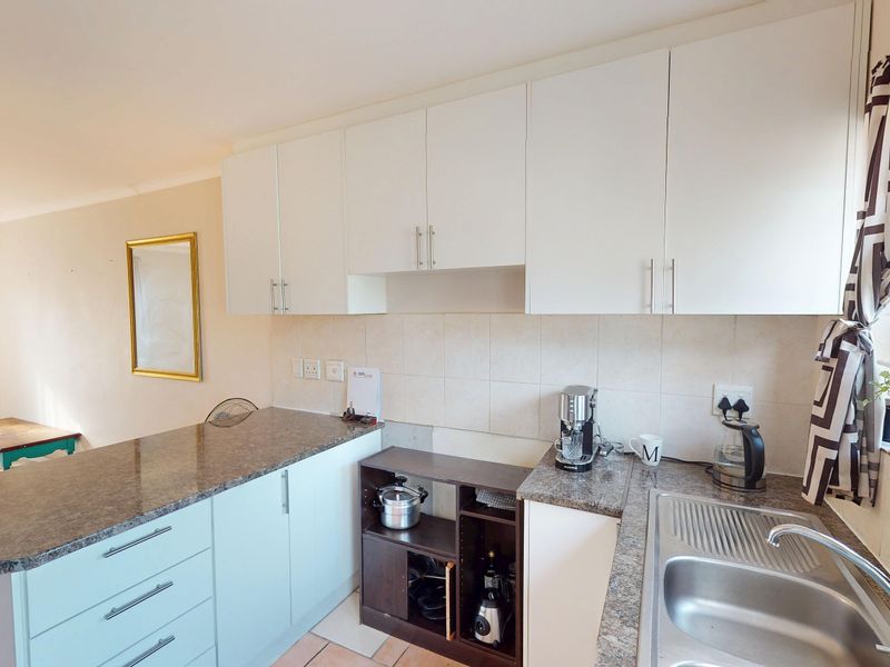 Secure 2-Bedroom Home in Sought-After Complex - Photo 8