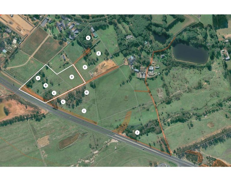 An aerial view showing the layout and boundaries of the vacant residential land parcel within the surrounding landscape.