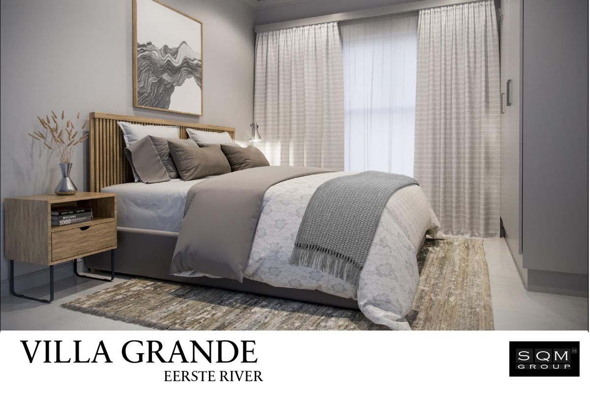 A modern, well-appointed bedroom featuring neutral tones, built-in storage, and large windows with elegant drapery.