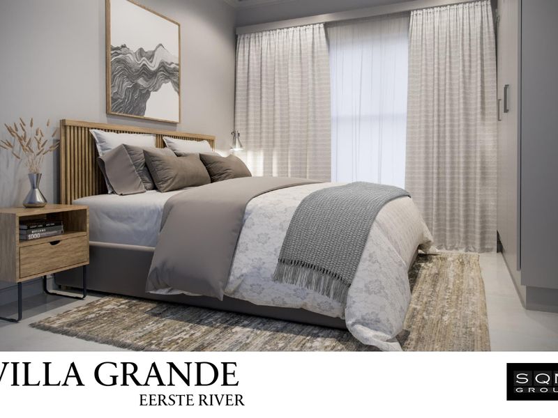 A modern, well-appointed bedroom featuring neutral tones, built-in storage, and large windows with elegant drapery.