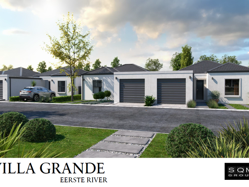 A modern townhouse development featuring clean architectural lines, multiple garage units, and well-maintained landscaped front gardens.