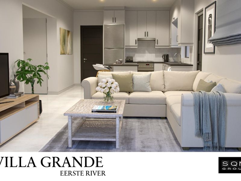 Modern open-plan living area featuring a contemporary kitchen with built-in cabinetry, integrated appliances, and sleek tiled flooring throughout.