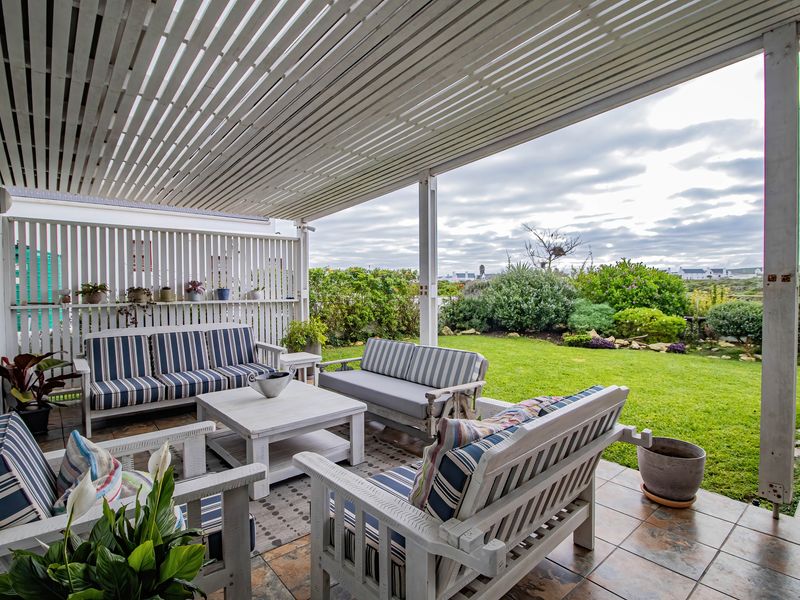 Spacious Coastal Home with Flatlet, Solar Power & Greenbelt Views in Jacobs Bay - Photo 4