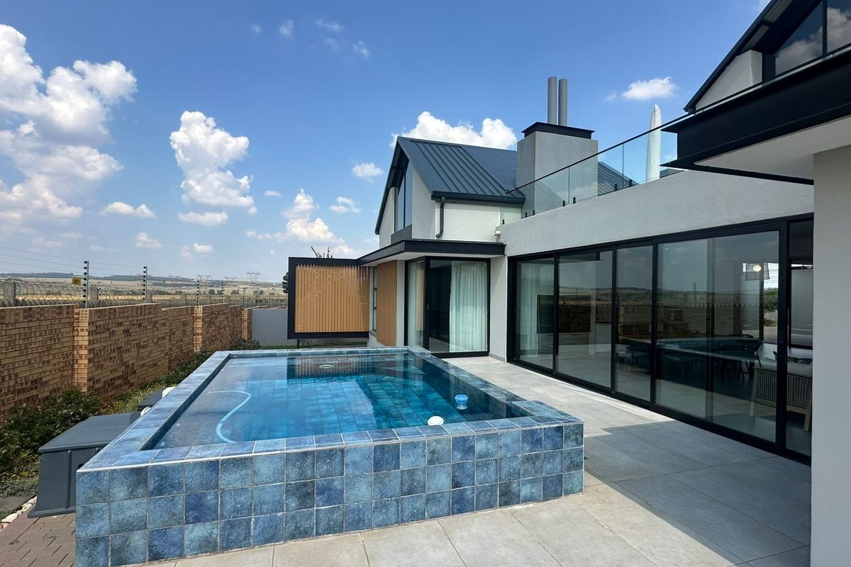 Exclusive Elegance in Midstream Heights - Photo 3
